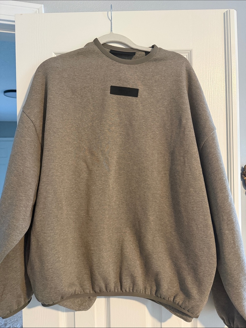 Essentials Gray Crewneck Sweatshirt with Small Black Patch